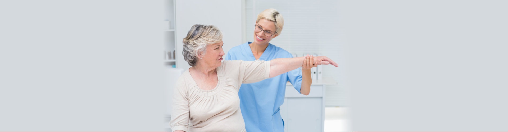 woman stretching with nurse